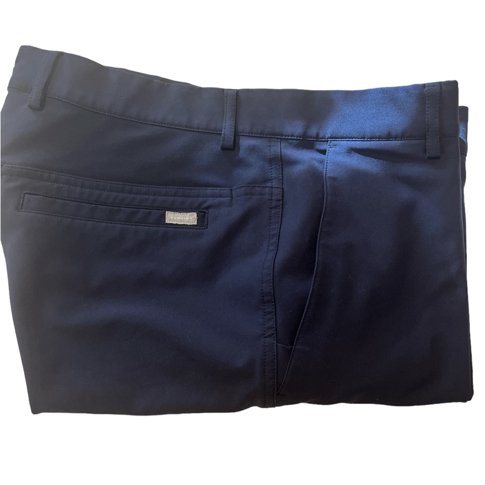 Dunning Men’s golf shorts size 34 waist.  Navy blue.  Extra button.